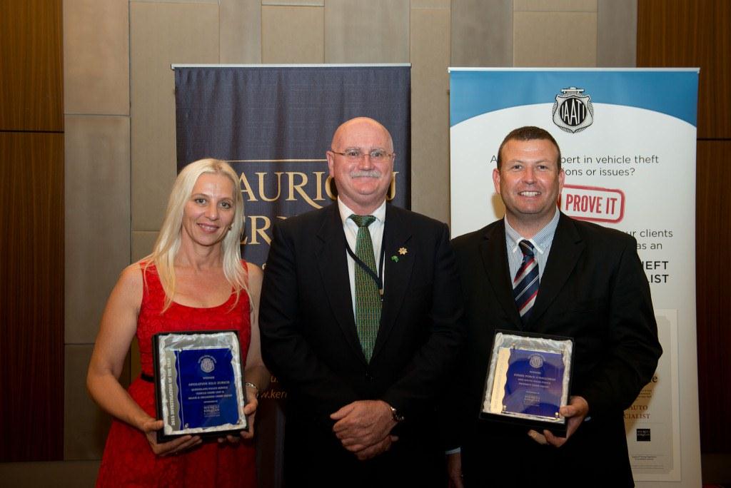 Joint winners of the 2015 Investgation of the Year -  (L-R) Cathy Horton, Queensland Police (Operation Kilo Zurich), Australasian Branch President John Hambridge, and Luke Simpson, NSW Police (Strike Force O'Halloran), 