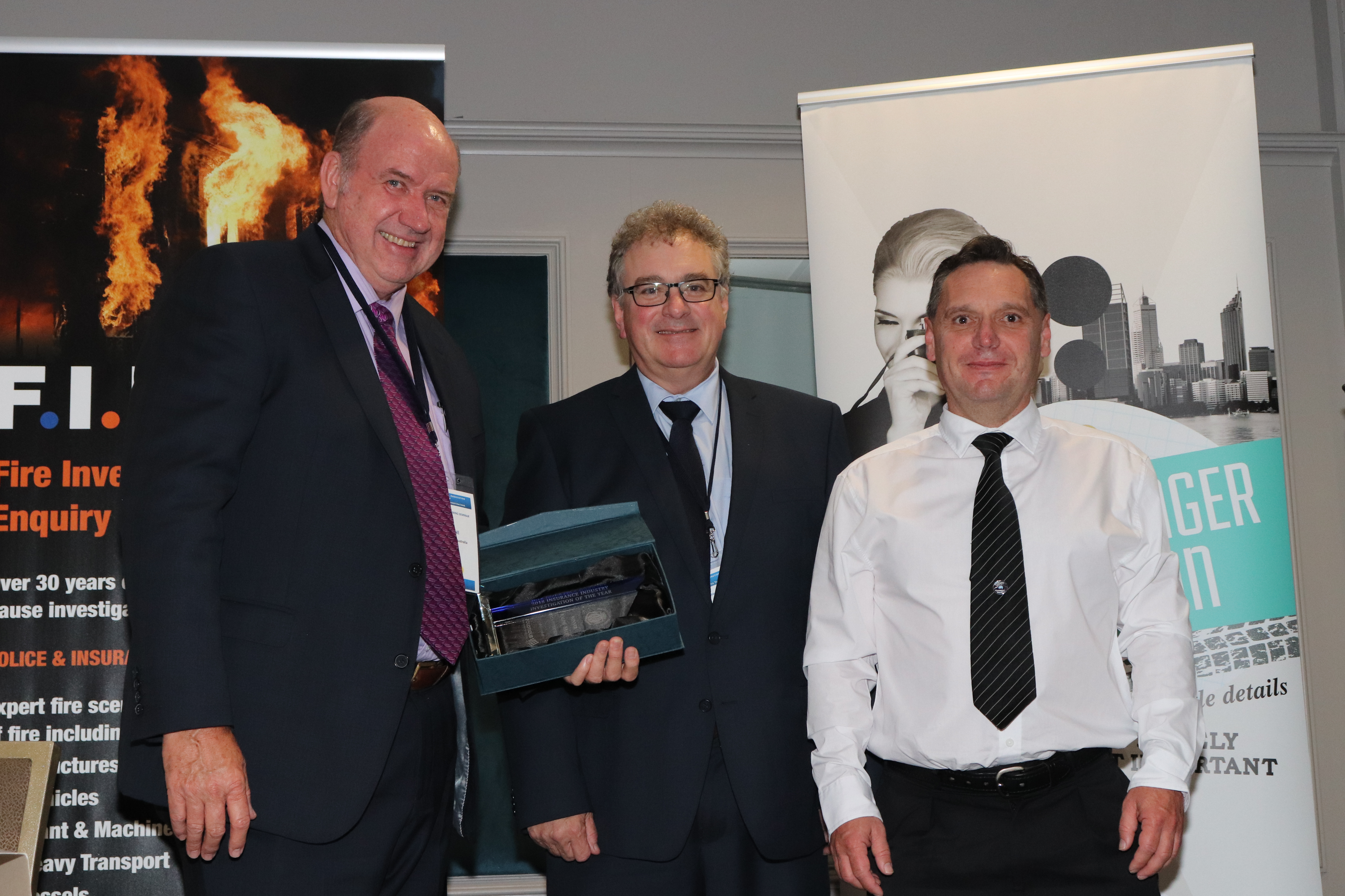 Accepted by Chris Loane (left) on behalf of Ralph Bach, with Award Sponsor Andrew Simpson from Polonious